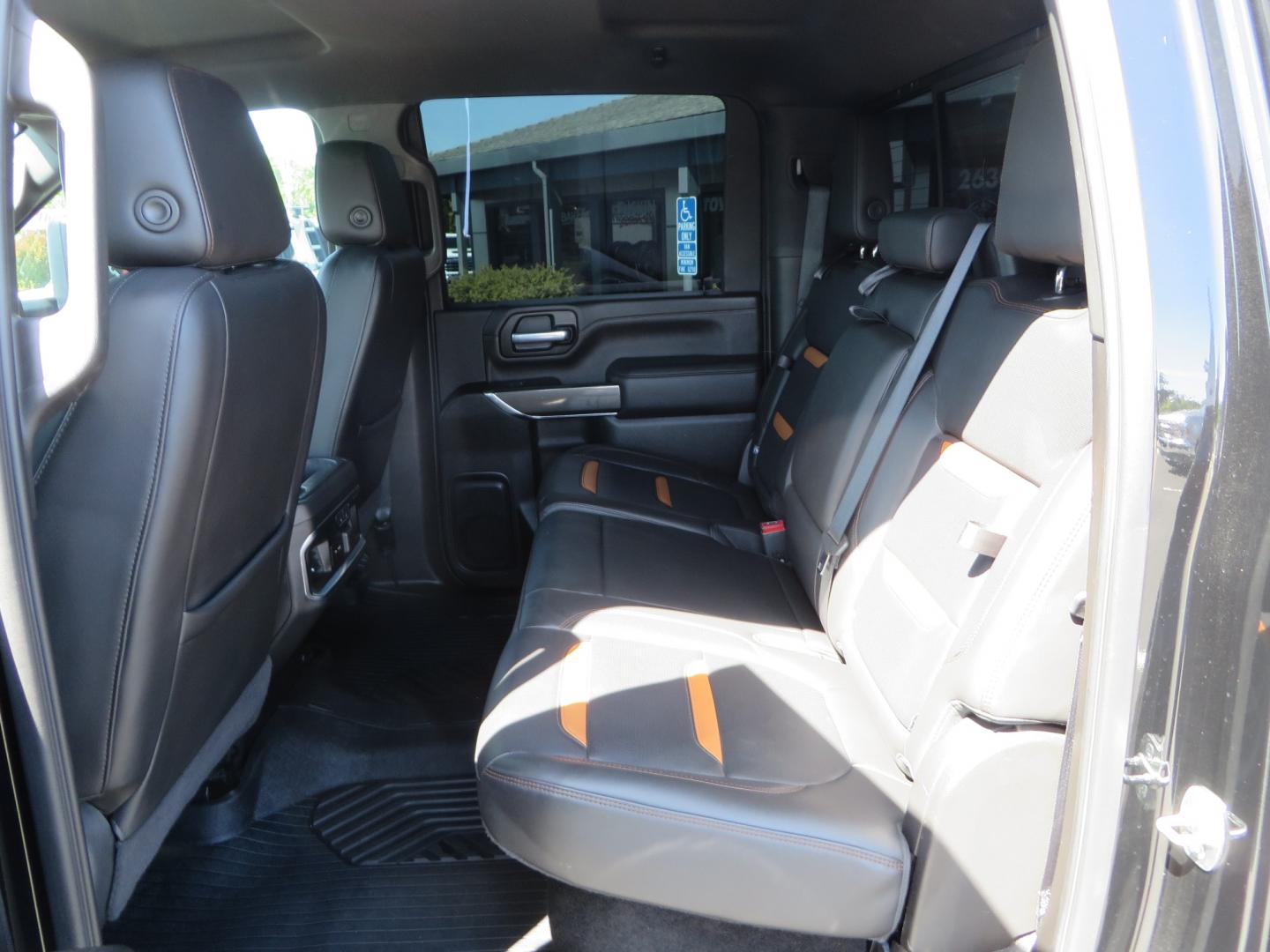 2020 BLACK /BLACK GMC Sierra 2500HD AT4 (1GT49PE76LF) with an 6.6L V8 engine, automatic transmission, located at 2630 Grass Valley Highway, Auburn, CA, 95603, (530) 508-5100, 38.937893, -121.095482 - Features a 3" BDS level kit with Fox shocks, 35" Toyo RT trail tires, 17" Method race wheels, JL audio Subwoofer, Window tint, and a power Tonneau cover. - Photo#31